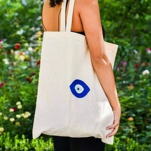 Evil eye embroidered tote bag